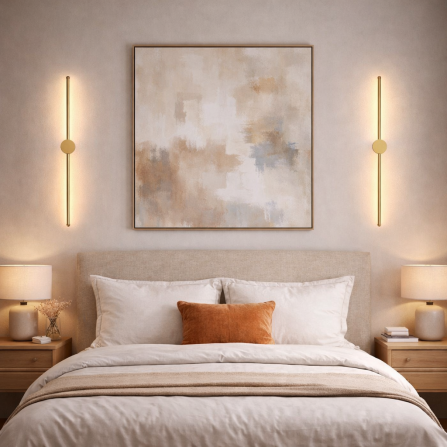 Moderna LED zidna lampa zlatne boje, pruža toplo belo svetlo (3000K) uz snagu od 12W.